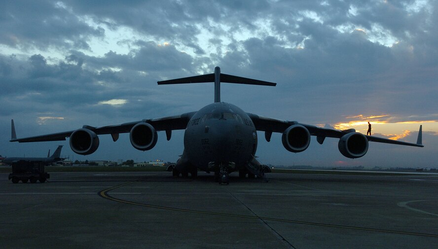 Staff Sgt. Daryl Washington performs a dropped object prevention inspection on a C-17 Globemaster III at Incirlik Air Base, Turkey, Nov. 15. More than half of all air cargo delivered to support Operation Iraqi Freedom is processed through here. Due to the close proximity of Incirlik to Iraq and the ability to land at more and smaller runways, flights from here have kept at least 3,300 convoy trucks and 9,000 servicemembers from harm's way. Sergeant Washington is a crewchief with the 728th Air Mobility Squadron. (U.S. Air Force photo/Tech. Sgt. Larry A. Simmons)