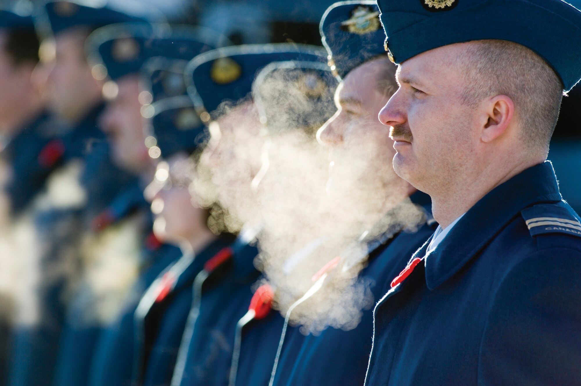 ELMENDORF AIR FORCE BASE, Alaska -- Capt. Blair Tuttle, Canadian Air Force, stands in formation during the Canadian Remembrance Day ceremony Nov. 11. Canadian Remembrance Day is held every year to remember those Canadian, U.S. and Allied servicemembers who have lost their lives at war.(U.S. Air Force photo by Senior Airman Garrett Hothan)