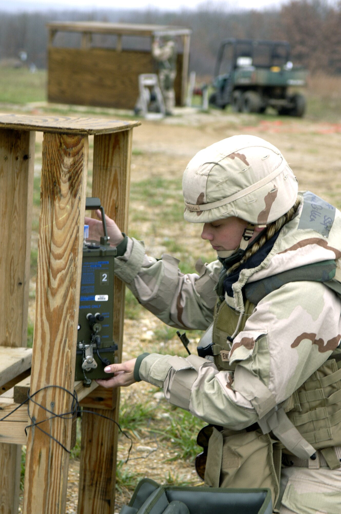 Staff Sgt. Renaissance Gildea sets up threat-detection network Nov. 16 during a readiness exercise at Fort Leonard Wood, Mo. The exercise is designed to give readiness Airmen training scenarios developed from lessons learned during operations Iraqi Freedom and Enduring Freedom. The two-day exercise is the part of a two-week training class here. (U.S. Air Force photo/Senior Airman Brian Ferguson)