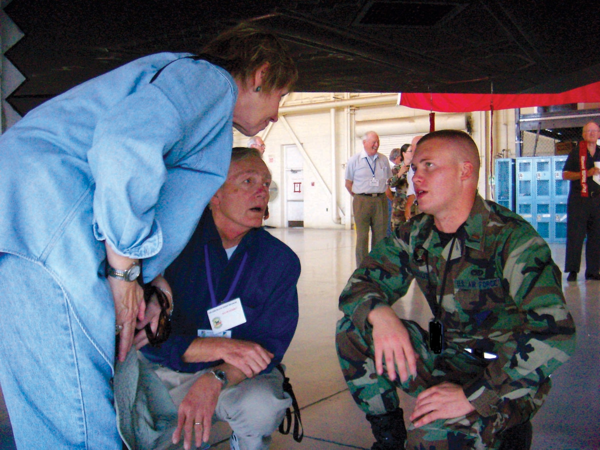 2nd Lt. Brian Hassler, 49th Aircraft Maintenance Squadron, answers questions about the F-117A from members of the 49th Fighter Group Nov. 9 while the group was on a tour of Holloman.