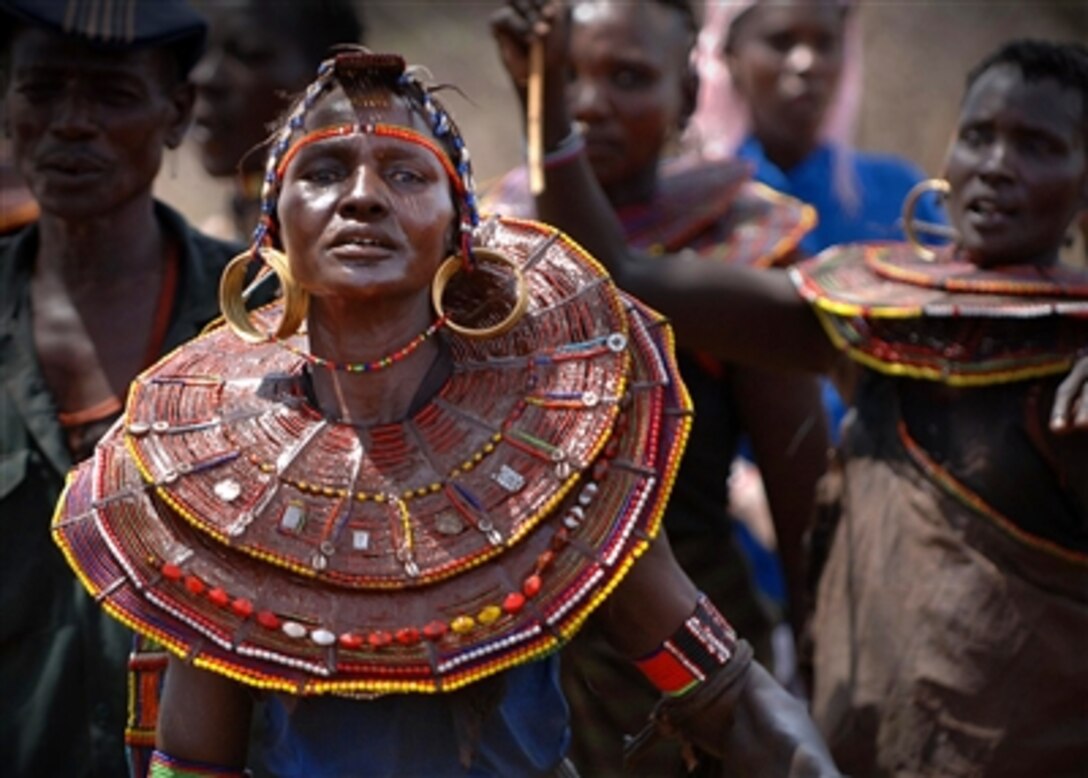 Local residents and parents participate in the dedication ceremony of the East African Nomadic Community Primary School in Riongo, Kenya, Nov. 3, 2006.