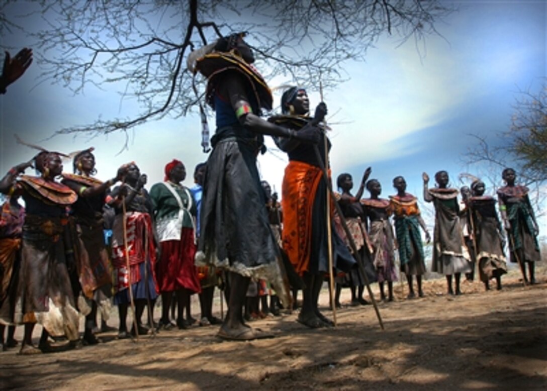 Local residents and parents participate in the dedication ceremony of the East African nomadic community primary school in Riongo, Kenya, Nov. 3, 2006.