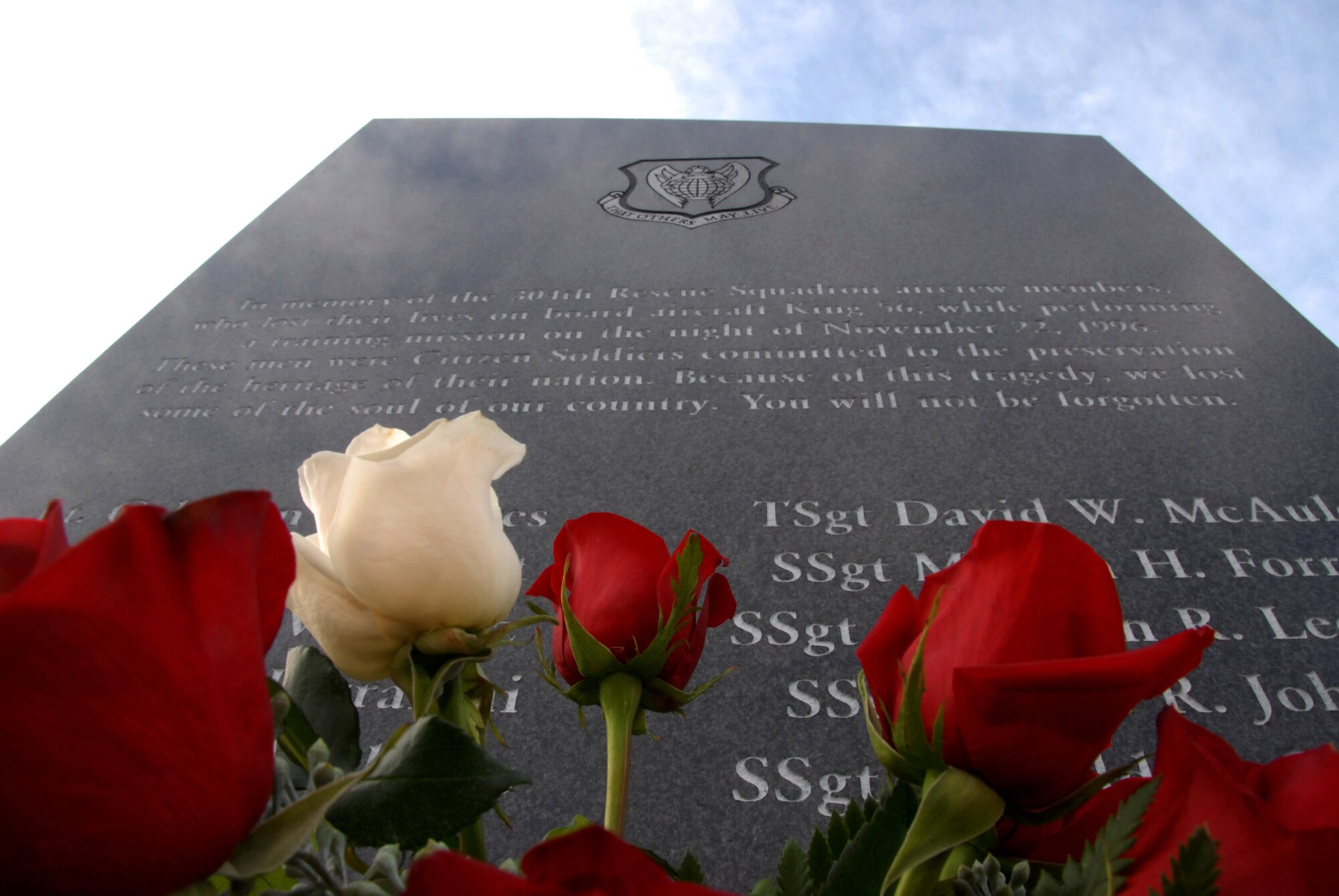 The memorial honoring the Airmen of the King 56 C-130 aircraft that crashed Nov. 22, 1996 was moved from the Portland Air National Guard Base, Ore, to the Williamette National Cemetery and was re-dedicated Nov. 17, 2006 by the friends and family members of the King 56 crew. (U.S. Air Force Photo/Master Sgt. Chance Babin)