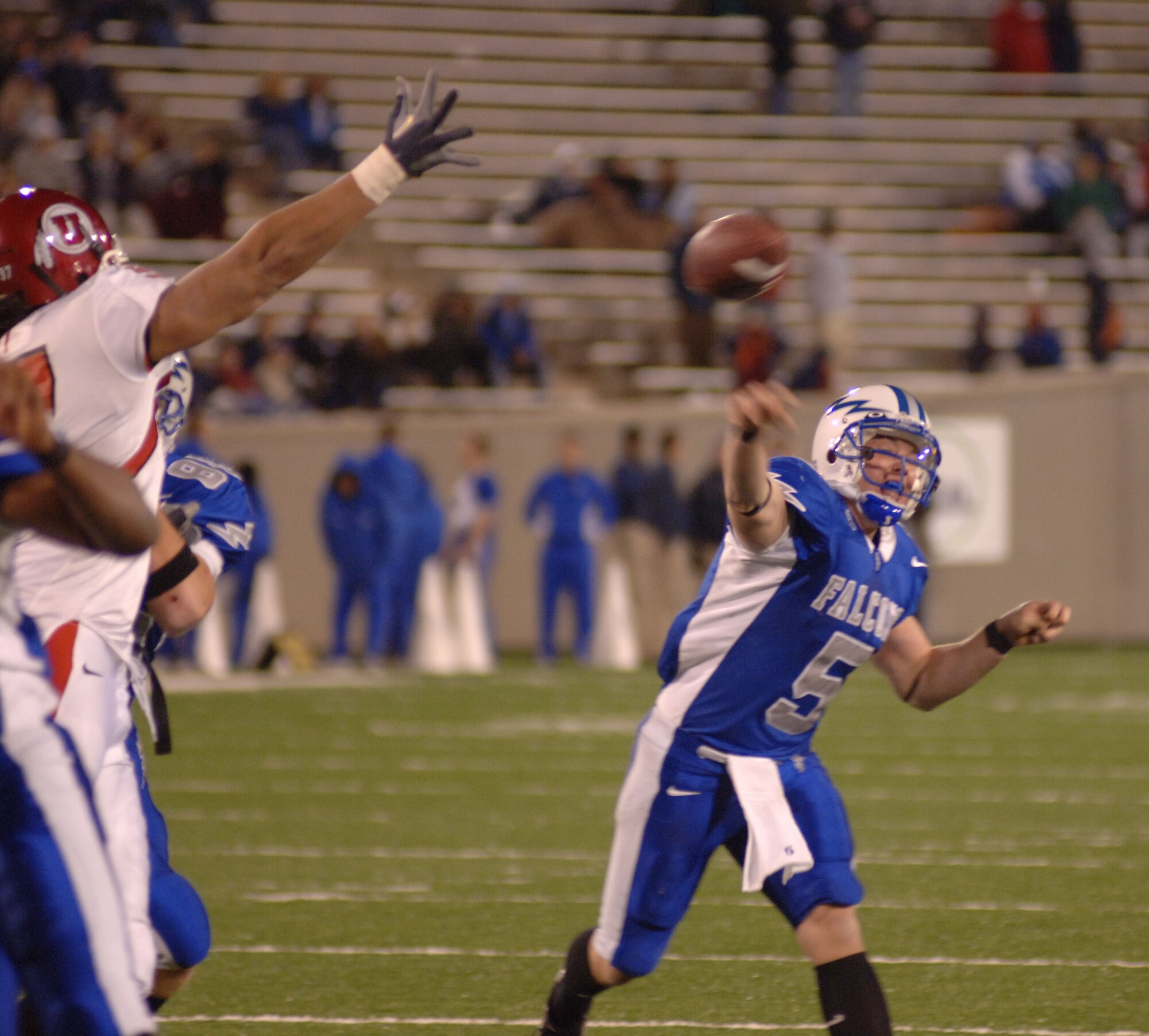 Air Force quarterback Shaun Carney throws a six-yard touchdown strike to receiver Victor Thompson early in the fourth quarter against Utah Nov. 18 in Colorado Springs, Colo. It was the first of two scores by the Falcons in the fourth quarter but not quite enough to hold off the Utes, who game-winning field goal as time expired seal a 17-14 Utah win.  (U.S. Air Force photo/1st Lt. John Ross)