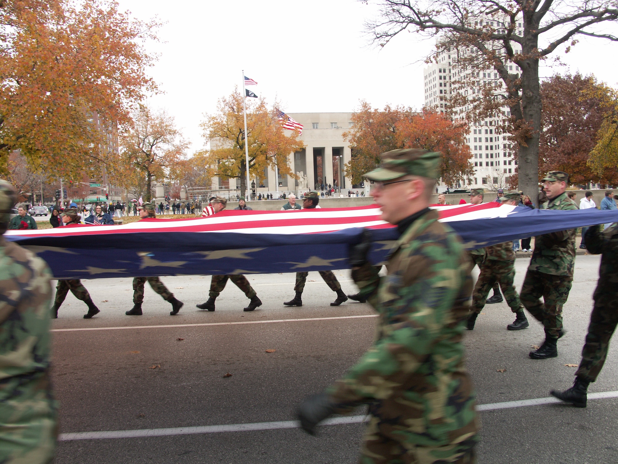Veterans were honored by members of the 932nd Airlift Wing, Air Force Reserve Command, located at Scott Air Force Base, Ill.  They marched their huge American flag through the streets of Saint Louis on a cold, blustery, November day.  Photo/Capt. Stan Paregien
