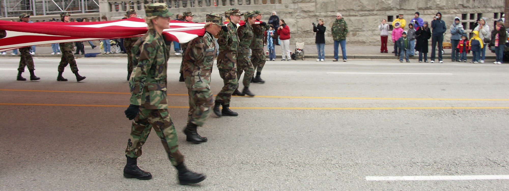 Veterans were honored by members of the 932nd Airlift Wing, Air Force Reserve Command, located at Scott Air Force Base, Ill.  They marched their huge American flag through the streets of Saint Louis on a cold, blustery, November day.  Photo/Capt. Stan Paregien
