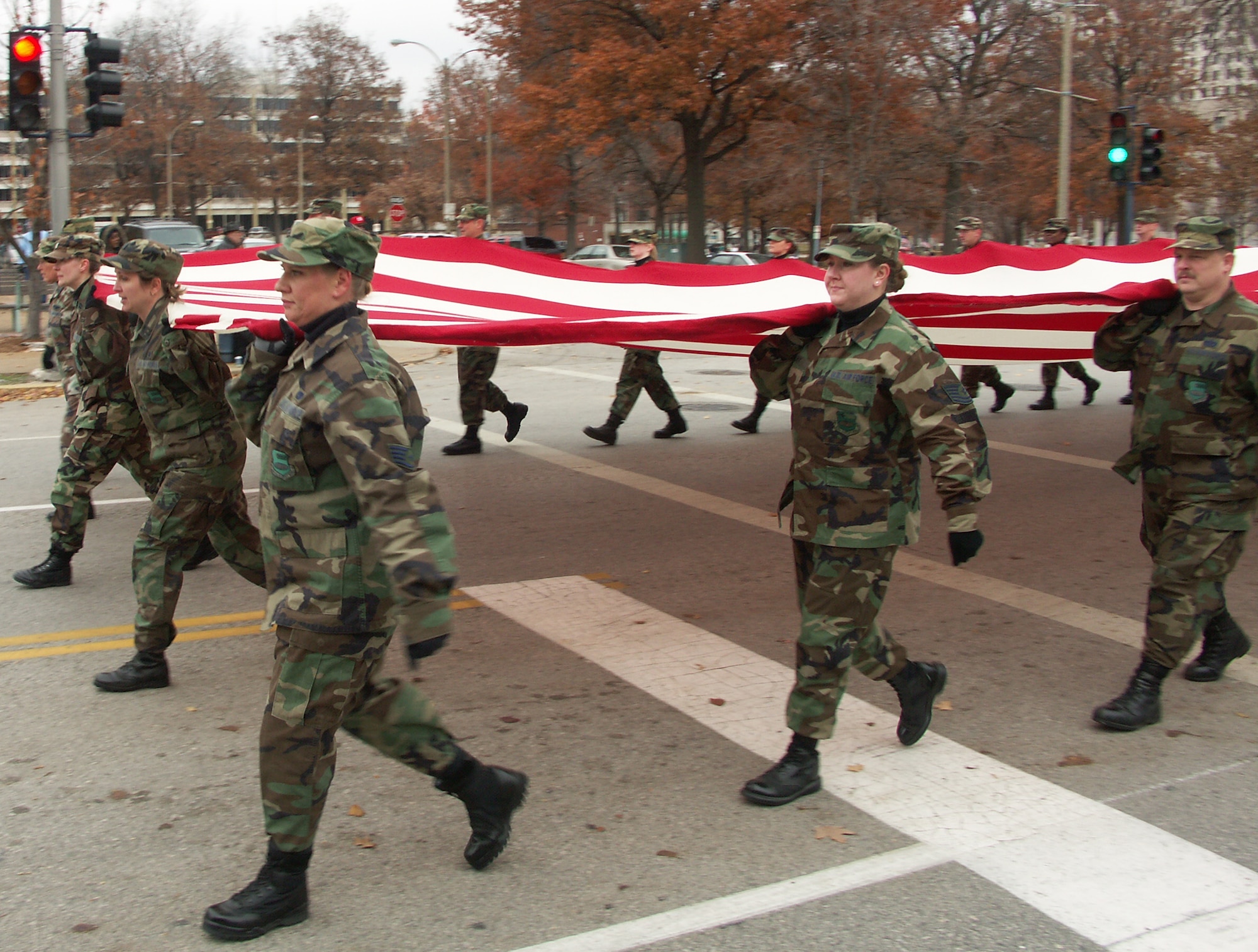 Veterans were honored by members of the 932nd Airlift Wing, Air Force Reserve Command, located at Scott Air Force Base, Ill.  They marched their huge American flag through the streets of Saint Louis on a cold, blustery, November day.  Photo/Capt. Stan Paregien
