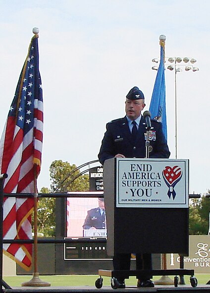(Photo by Bob Farrell) Col. Bryan Benson, 71st Flying Training Wing commander, speaks at Enid’s Freedom Walk ceremony Monday at David Allen Memorial Ballpark. The walk honored the events of Sept. 11, 2001.