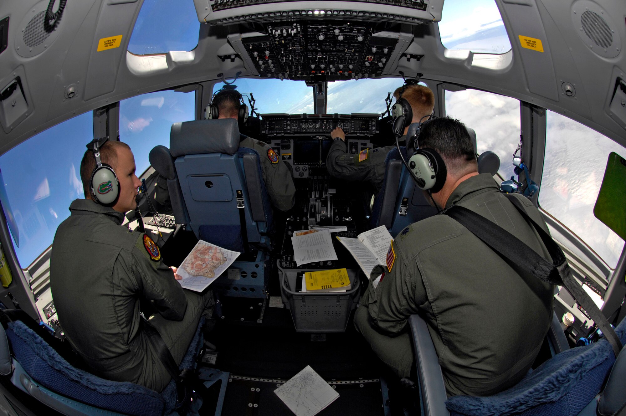 Pilots from the 535th Airlift Squadron from Hickam Air Force Base, Hawaii, fly their C-17 Globemaster III during a local training mission Nov. 15 over the Hawaiian Islands. (U.S. Air Force photo/Tech. Sgt. Shane A. Cuomo)