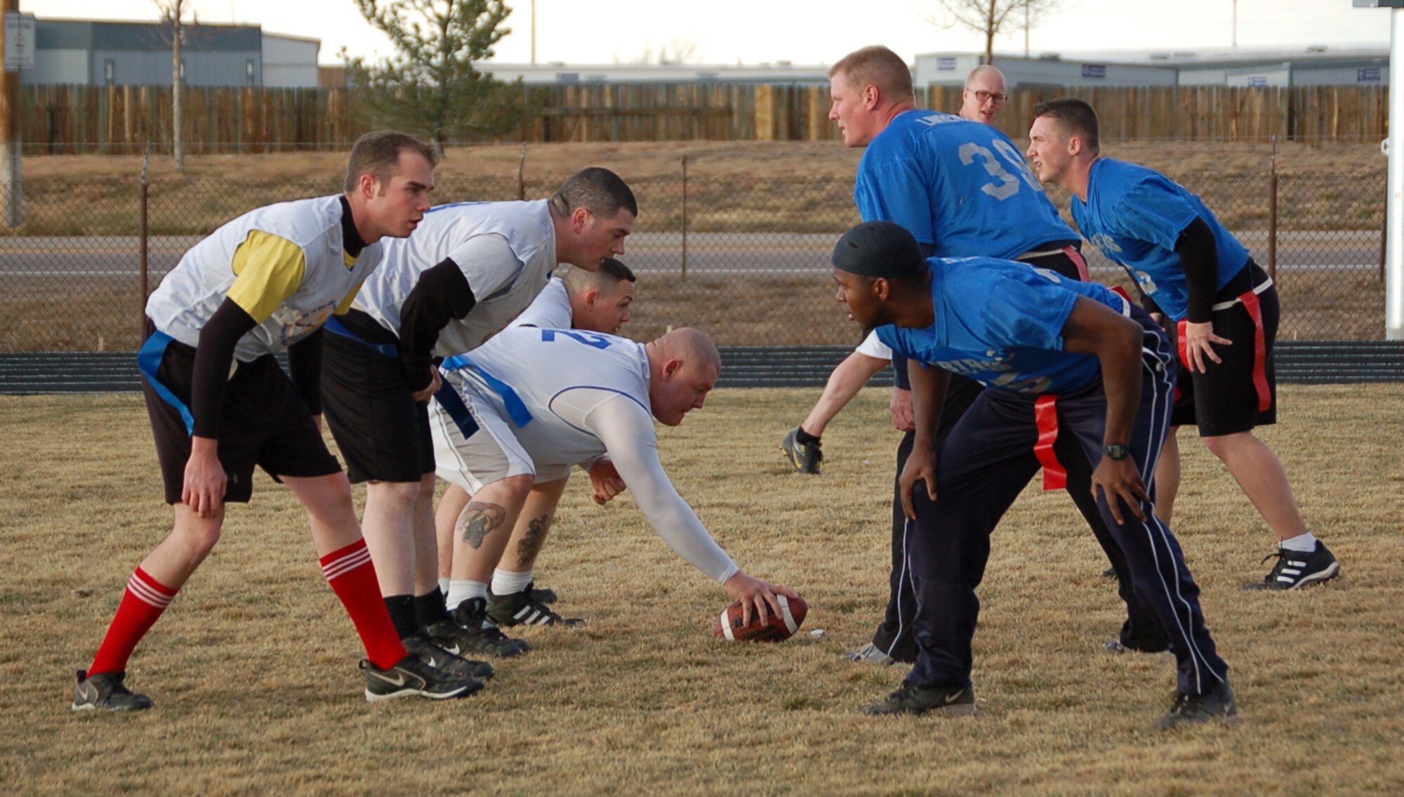 The 566th Information Operations Squadron and 460th Operations Support Squadron/2nd Space Warning System intramural flag football teams face off in the championship game Nov. 16. The 566th IOS shut out the 460th OSS/2nd SWS 13-0.