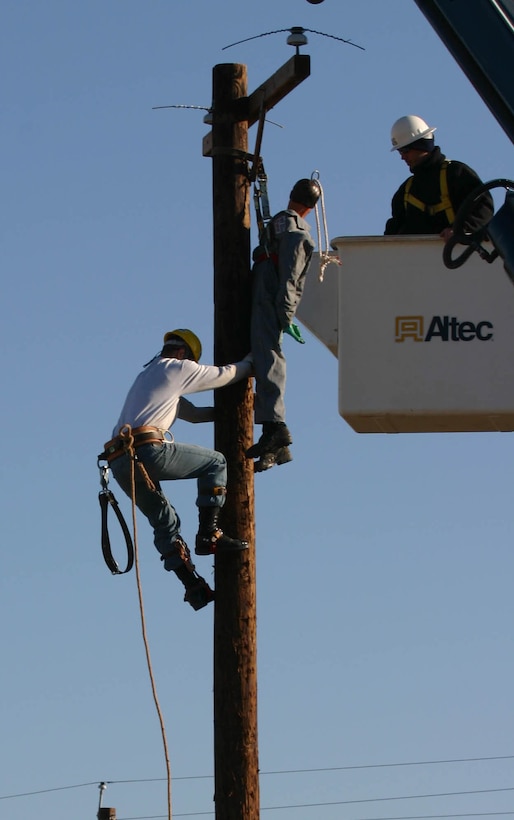 Airman Francis Mouawad ascends a telephone pole to rescue an electrocution “victim” during the semi-annual Student Lineman’s Rodeo at the 366th Training Squadron Saturday. Airman Mouawad was the overall winner of the rodeo. (U.S. Air Force photo/Airman Jacob Corbin).