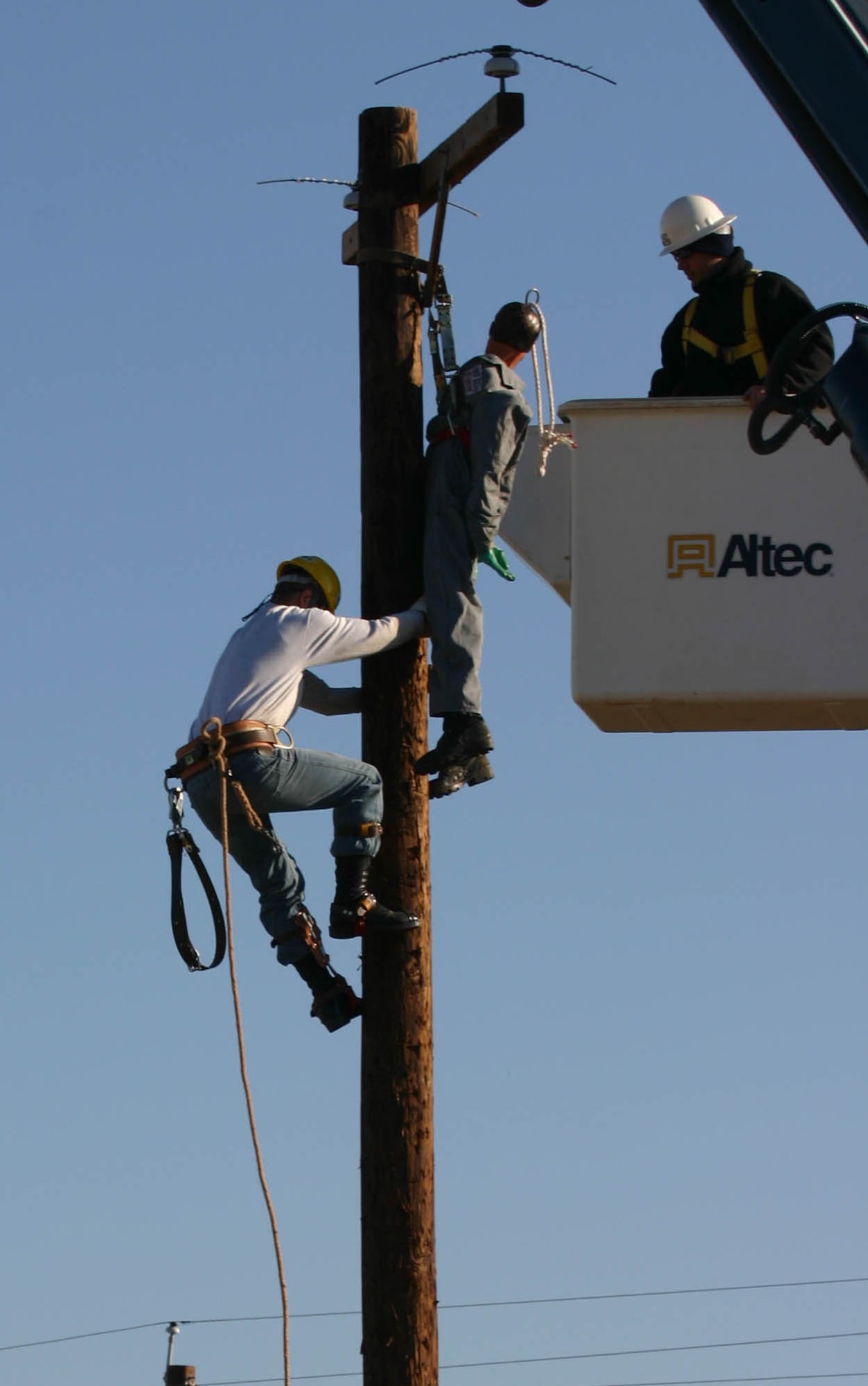 Airman Francis Mouawad ascends a telephone pole to rescue an electrocution “victim” during the semi-annual Student Lineman’s Rodeo at the 366th Training Squadron Saturday. Airman Mouawad was the overall winner of the rodeo. (U.S. Air Force photo/Airman Jacob Corbin).