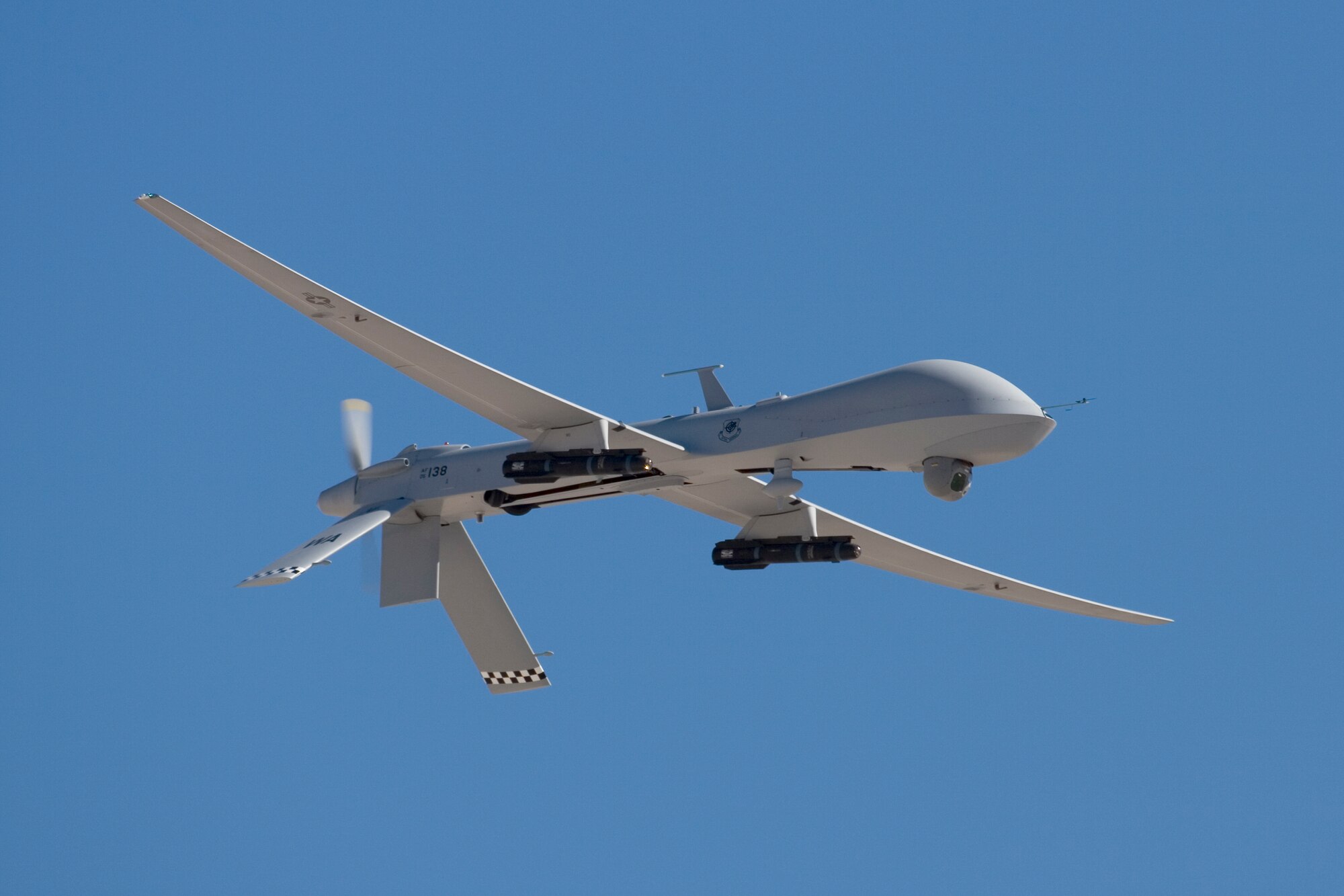 An MQ-1 Predator unmanned aerial vehicle flies over the Nellis runways Nov. 12 during the air show. The Predator is based at nearby Creech Air Force Base, Nev. (Photo courtesy Dave Cibley)