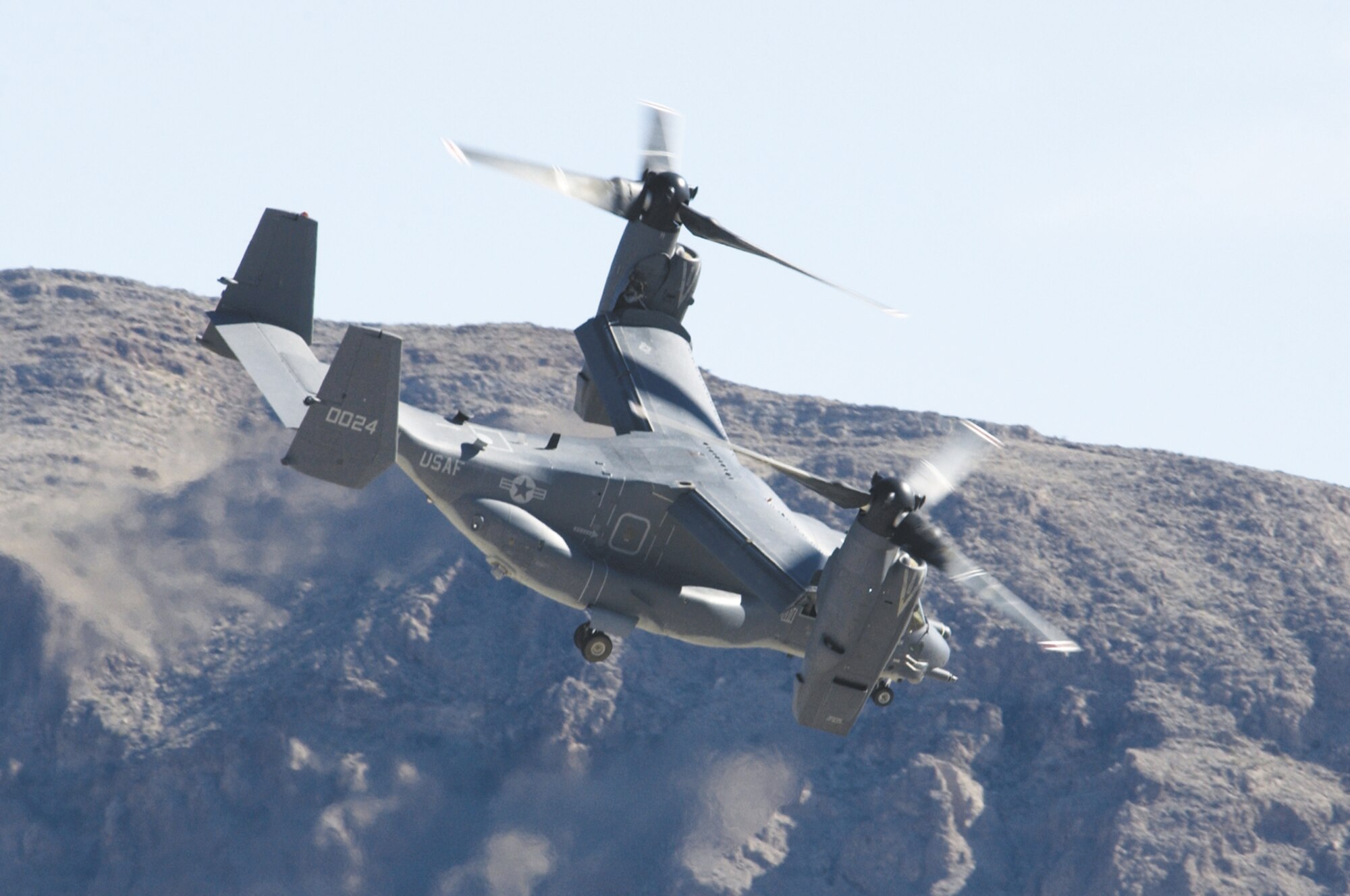 An Air Force CV-22 Osprey flies over Nellis -- the first time it has made an appearance at an air show. (U.S. Air Force photo/Master Sgt. Kevin Gruenwald)