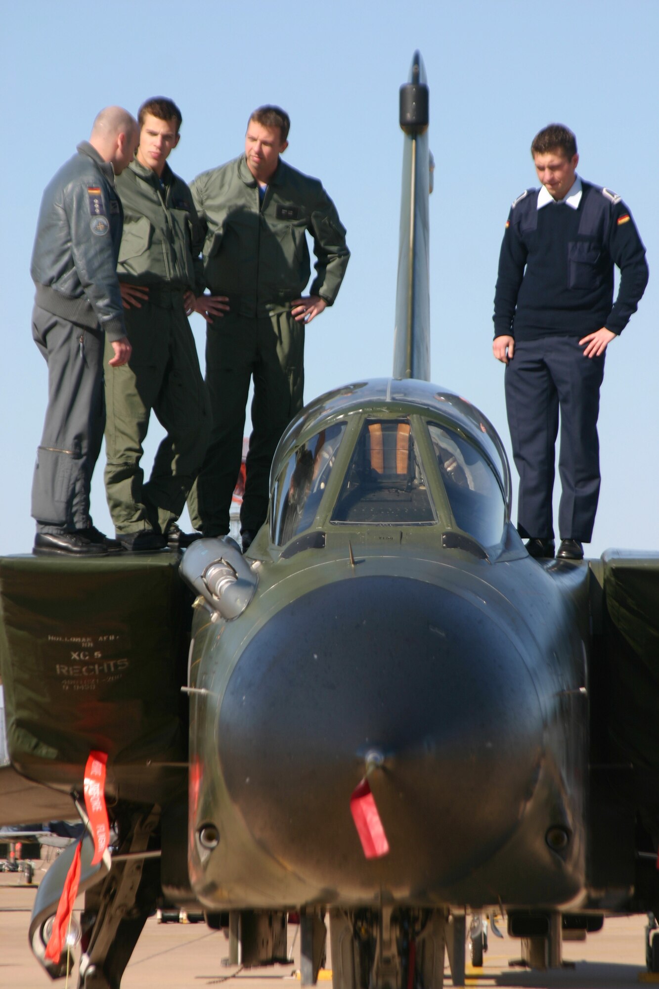 German Air Force student pilots talk to the pilot of a German Tornado Nov. 17 at the 80th Flying Training Wing's annual Combat Air Force Day. German student pilots will eventually fly one of three aircraft: the Tornado, F-4 or Euro Fighter. (U.S. Air Force photo/John Ingle)