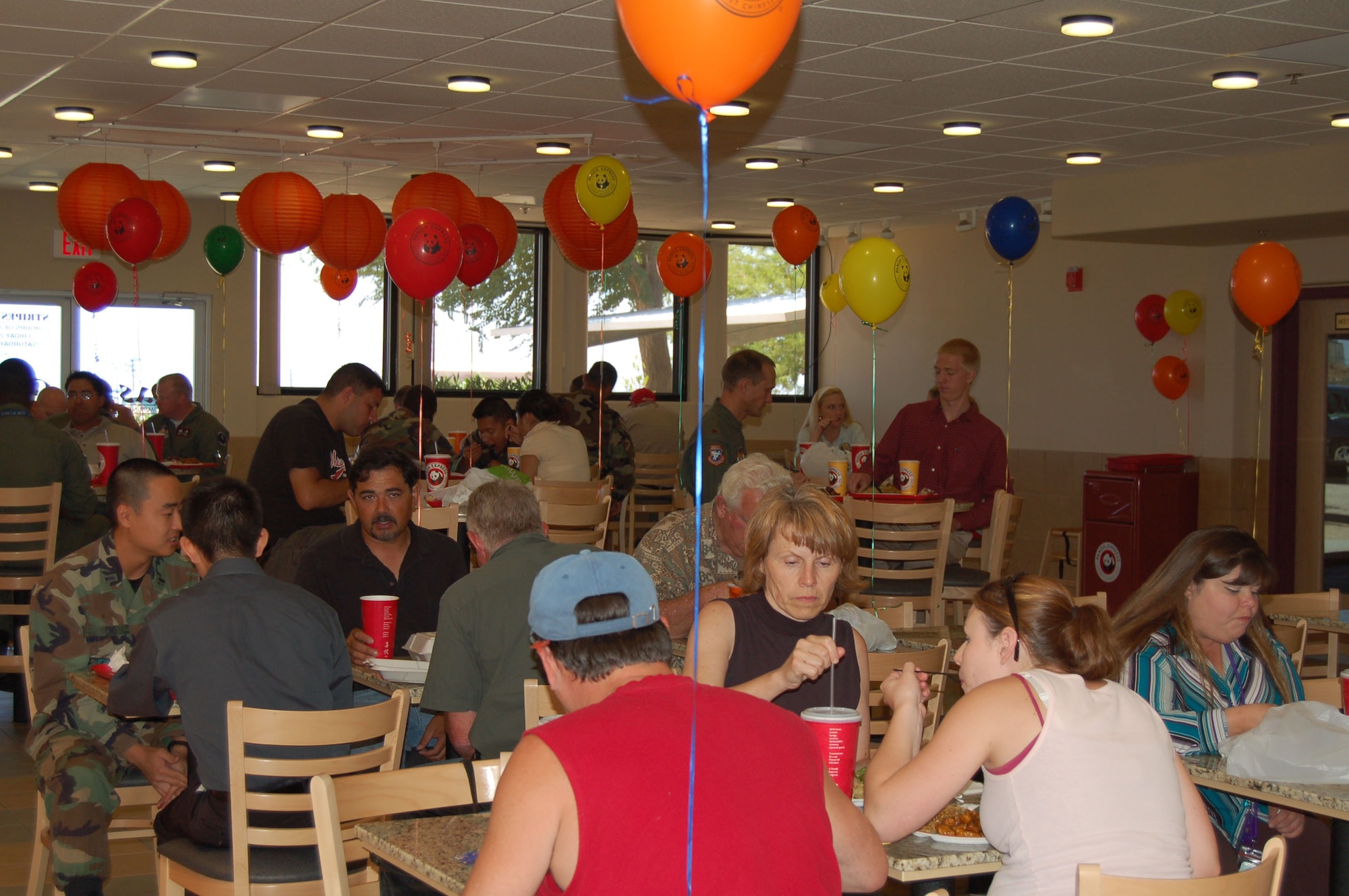 Panda Express offered free lunch to 100 family members of deployed personnel during the restaurant's grand opening here July 5, 2006.  (Photo by Airman 1st Class Julius Delos Reyes)