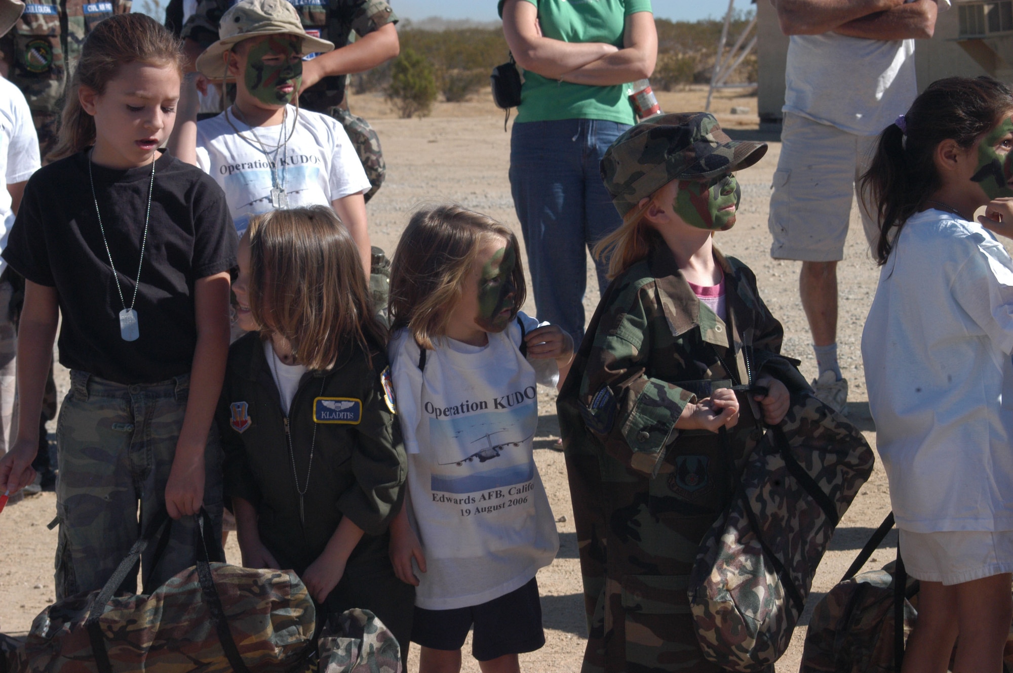 Young troops line up in formation awaiting their section assignments.  (Photo by Airman Stacy Garcia)