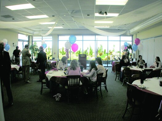 Members of Hearts Apart, a group for spouses of deployed military members from Edwards, gather at the Cascades Grill in Palmdale, Calif. for a luncheon sponsored by the Joint Military Affairs Committee on Feb. 14, 2006.  (Photo by Christopher Ball)