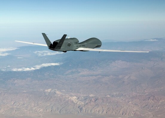 An RQ-4 Global Hawk unmanned aerial vehicle, the last Block 10 production aircraft, arrives here June 15, 2006, for a thorough checkup before delivery to the warfighter. (Photo by Jim Shryne)