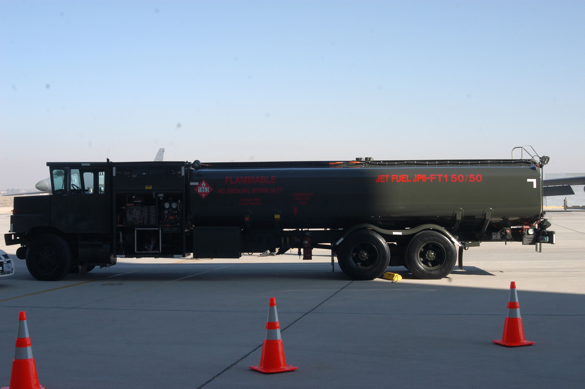 The refueling truck used for B-52 Stratofortress testing of the new alternative fuel parks outside a South Base hangar. The refueling truck used the same Fischer-Tropsch and jet fuel JP8 blend the B-52 used.   (Photo by Staff Sgt. Mark Woodbury)