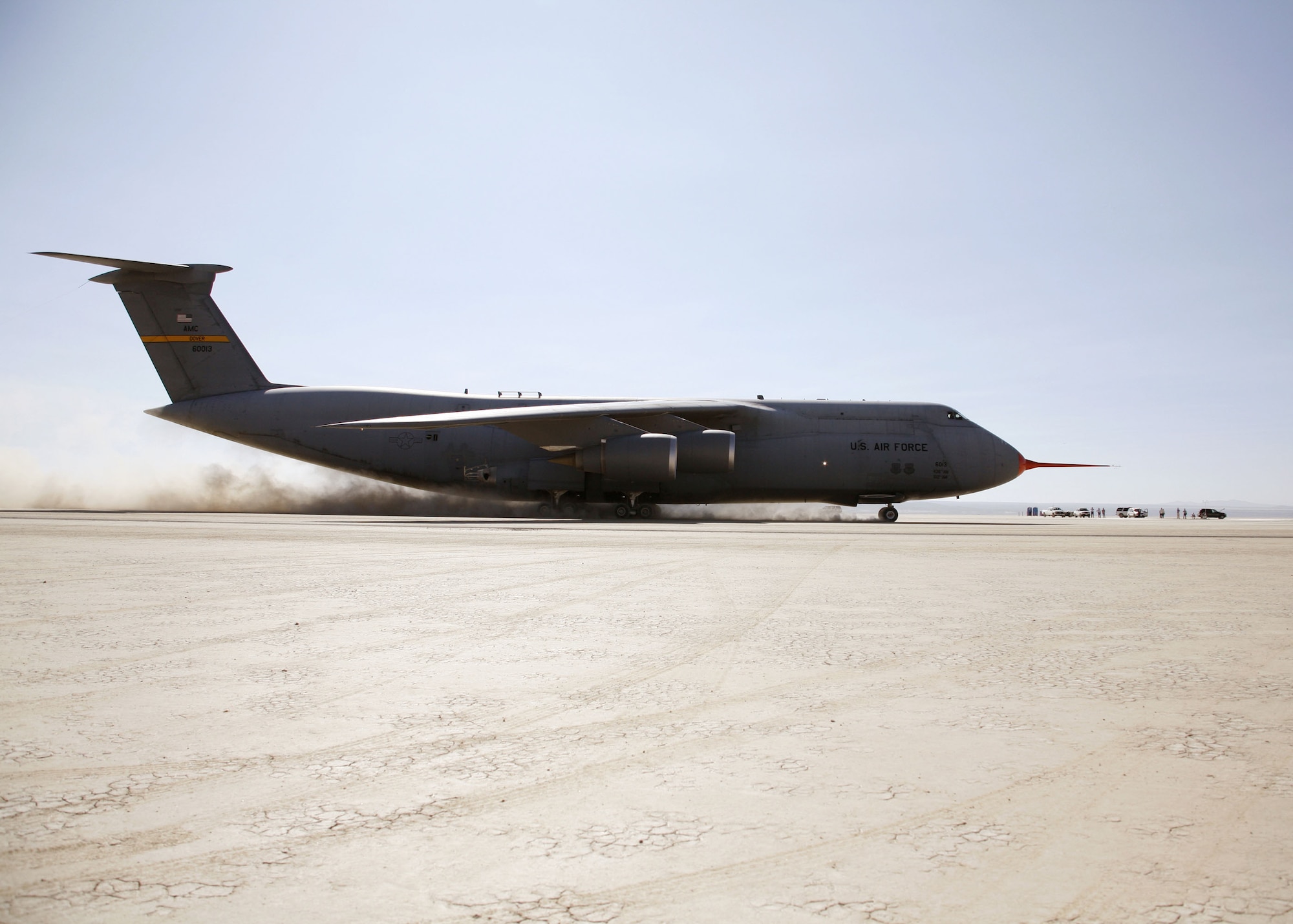 A C-5 Galaxy taxis across a series of ramps on Rogers Dry Lakebed here Aug. 2, 2006, as part of the C-5's Reliability Enhancement and Re-Engining Program. The dynamic tests are designed to evaluate the structural modes of the aircraft with newer CF6 jet engines installed.  (Photo by Jet Fabara)