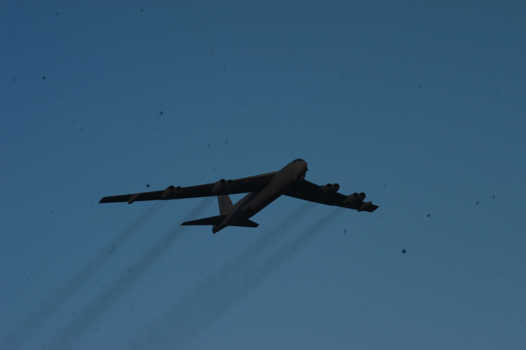 A B-52, partially powered by a Fischer-Tropsch fuel blend, flies over Edwards during a demonstration flight here Sept. 19, 2006. Officials say the natural gas-based synthetic fuel is one of many options the Air Force is researching as an alternative to regular jet fuel.  (Photo by Staff Sgt. Mark Woodbury)