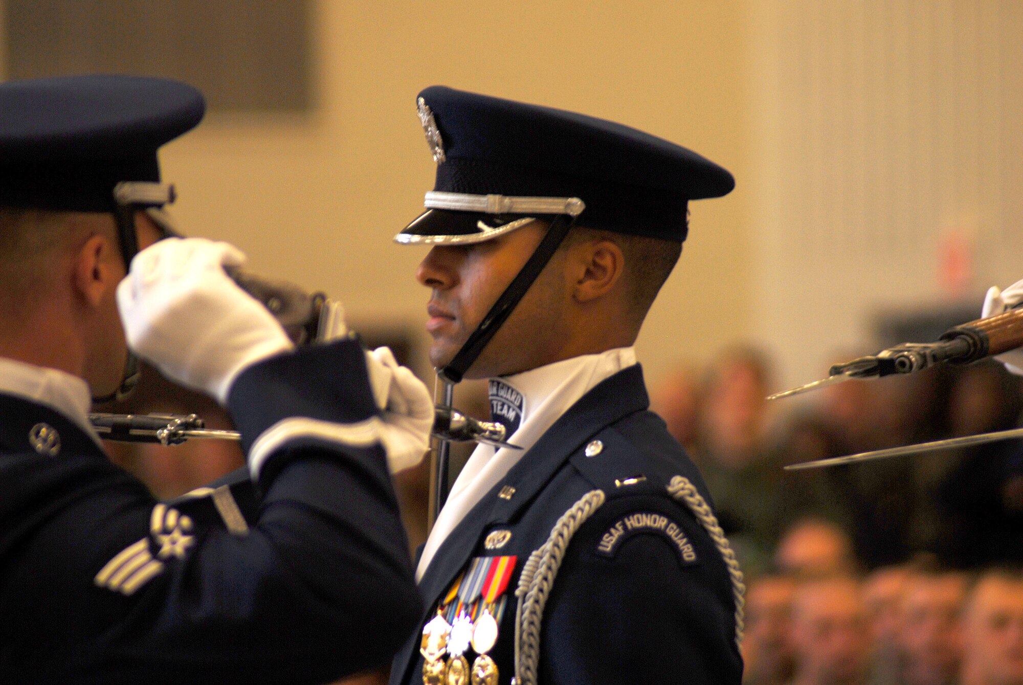 First Lt. Joshua Hawkins, Air Force Honor Guard Drill Team commander, stands at attention during a drill by members of the four-man drill team. The drill team unveiled their new performances for 2007 Nov. 21 at Bolling Air Force Base, D.C. (U.S. Air Force photo/Staff Sgt. Madelyn Waychoff) 
