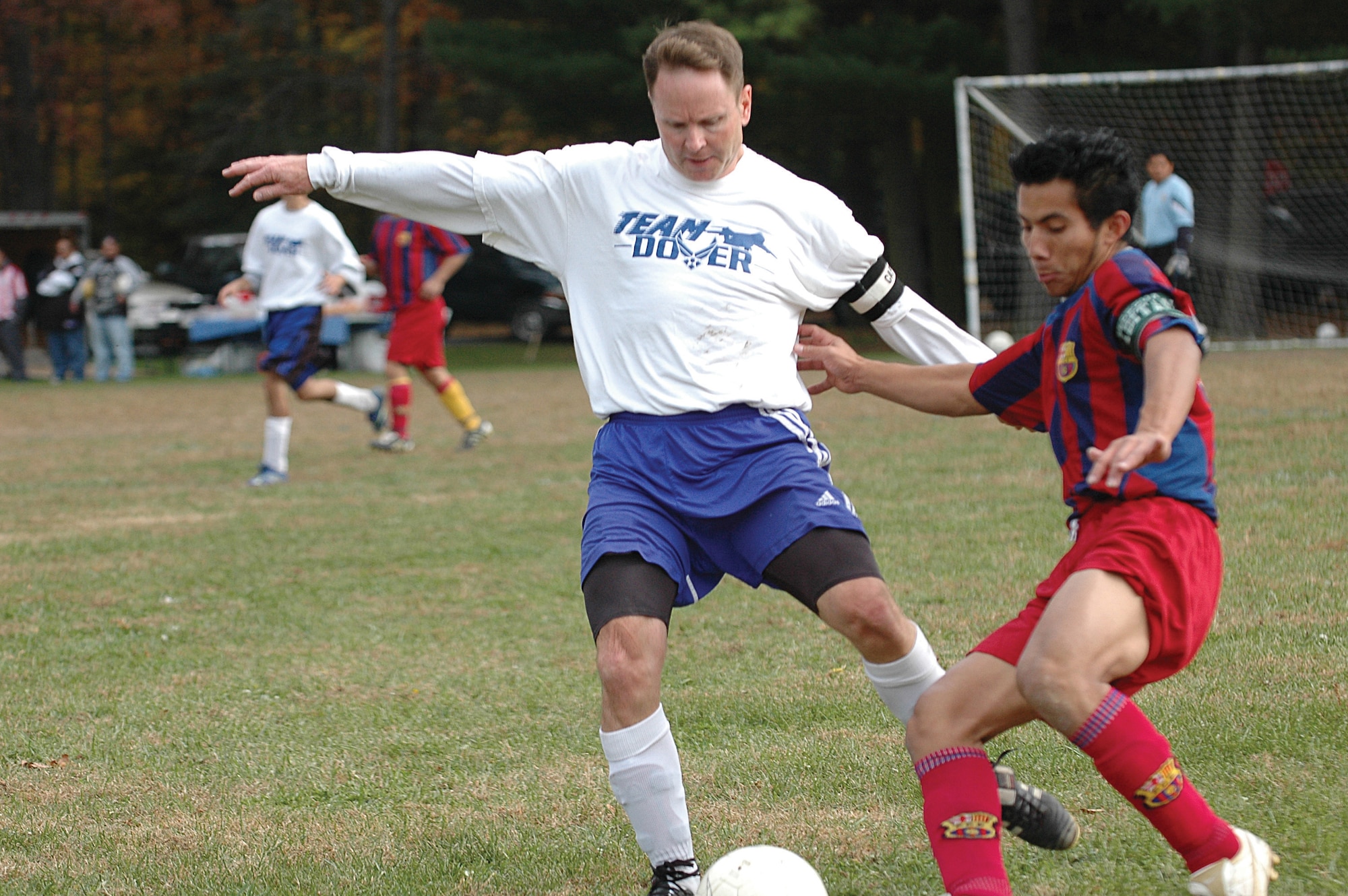 DOVER AIR FORCE BASE, Del. -- Lt. Col. Louis Patriquin, 512th Operations Group deputy commander at Dover Air Force Base, Del., played an essential midfield position keeping his opponents from scoring a goal on his team during a championship soccer game held at Dover Park Nov. 5. As of this game, Team Dover's record is 11-4, ranking them sixth in their league. The team consists of players from the 436th and 512th Airlift Wings. The 512th Airlift Wing is an Air Force Reserve Command unit. (U.S. Air Force photo/Senior Airman Steve Germann)
