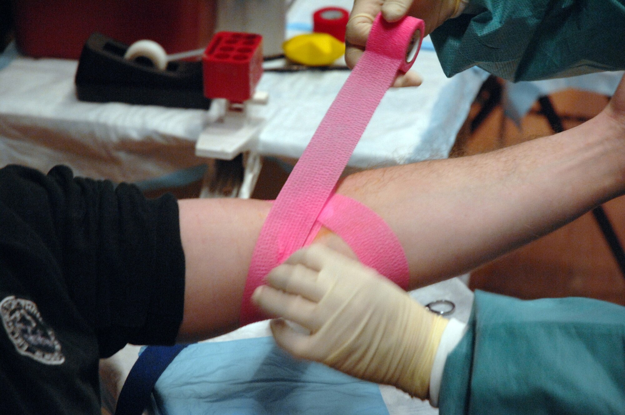 EIELSON AIR FORCE BASE, Alaska -- Master Sgt Troy Baird gets the mark of honor as a member of the Blood Bank of Alaska covers the spot where he gave blood during the mobile blood drive here on 21 Nov. The Blood Bank of Alaska supplies blood to military and civilian hospitals throughout Alaska.
(U.S. Air Force Photo by Staff Sgt Joshua Strang)