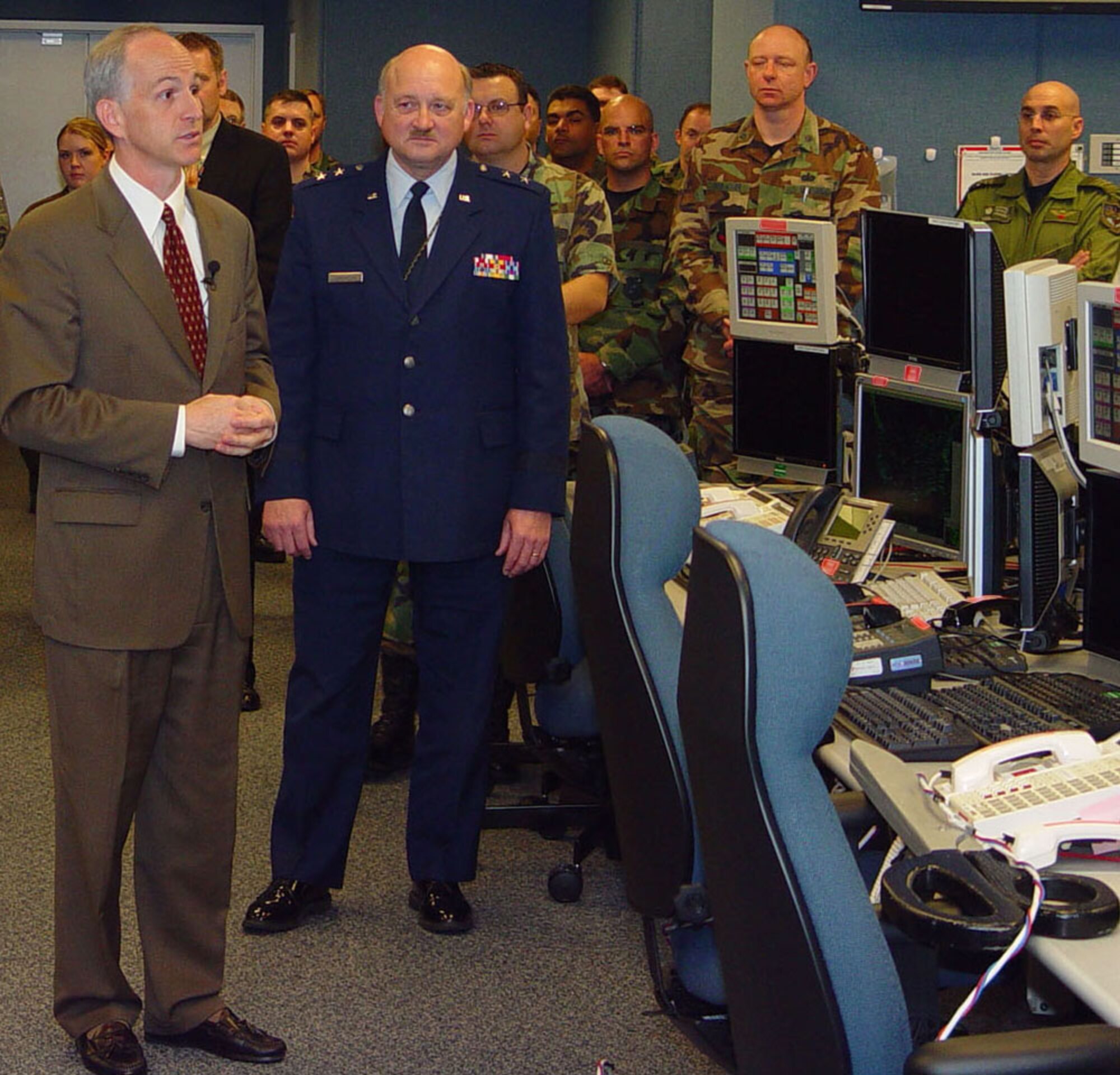 Representative Adam Smith (left) and Maj. Gen. Timothy J. Lowenberg preside at the grand opening of the Western Air Defense Sector?s state-of-the-art operations floor Nov. 20.  The ceremony culminated an 18-month effort that now stands WADS as a significant, technically-advanced deterrent against asymmetrical threats over a significant portion of America?s airspace.  Congressman Smith represents Washington State?s 9th District; General Lowenberg is Washington State?s adjutant general.  (U.S. Air Force photo/Randy Rubattino)