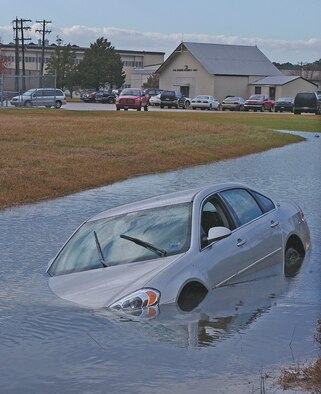 This 2006 Chevrolet Impala was found in the ditch located near the 4th Security Forces Squadron and Brass Flag Thursday after the driver lost control of the vehicle during the thunderstorm Thursday.  The occupant was unharmed by the accident.                               