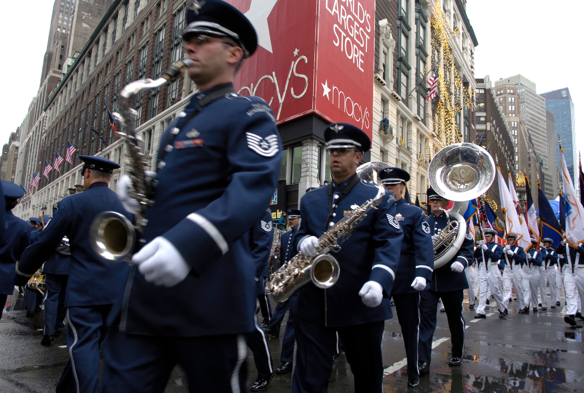 The U.S. Air Force Academy Marching Band rounds the corner of Broadway and 34th street at the 80th Macy's Thanksgiving Day Parade in New York City, NY,, Nov. 23,
(U.S. Air Force photo/Senior Airman Brian Ferguson)
