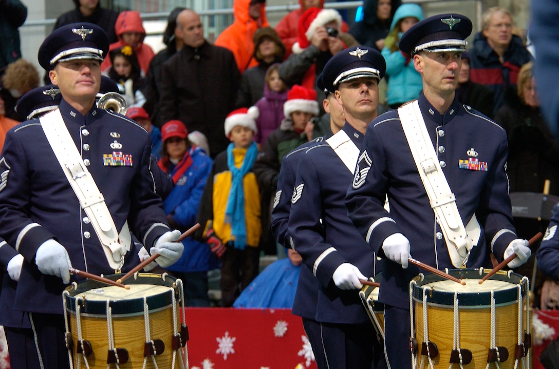 Members of the U.S. Air Force Academy Marching Band play for spectators at the review stand of the 80th Macy's Thanksgiving Day Parade in New York City, N.Y., Nov. 23. (U.S. Air Force photo/Senior Airman Brian Ferguson)
