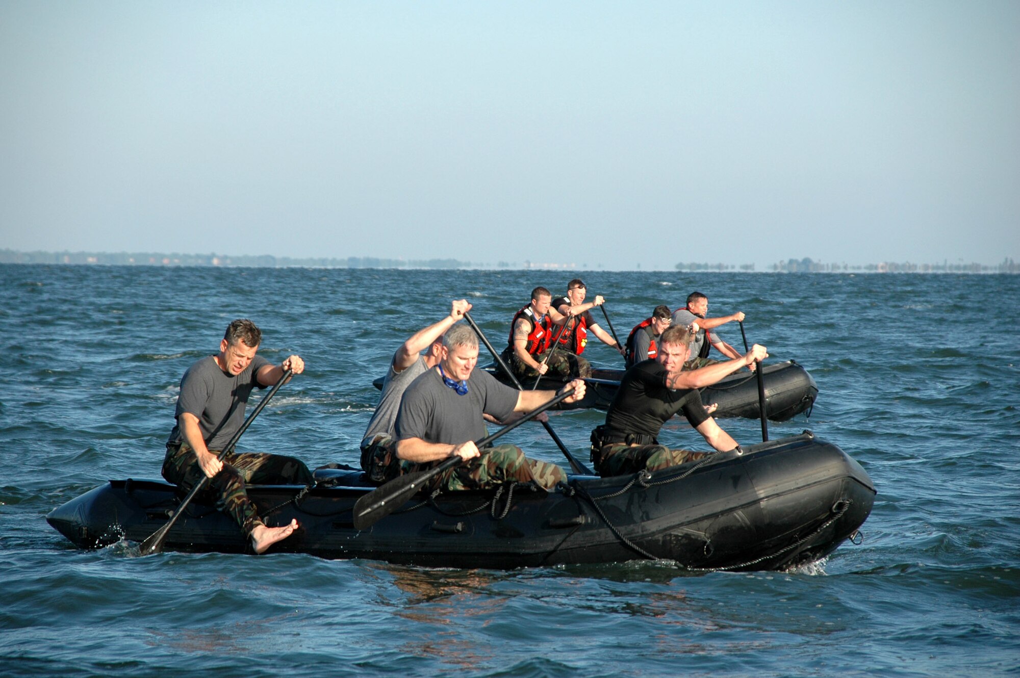 Pararescueman from the 308th Rescue Squadron row inflatable boats to shore on the Banana River during an exercise at Patrick Air Force Base, Fla., Nov. 17. (U.S. Air Force photo/1st Lt. Cathleen Snow) 