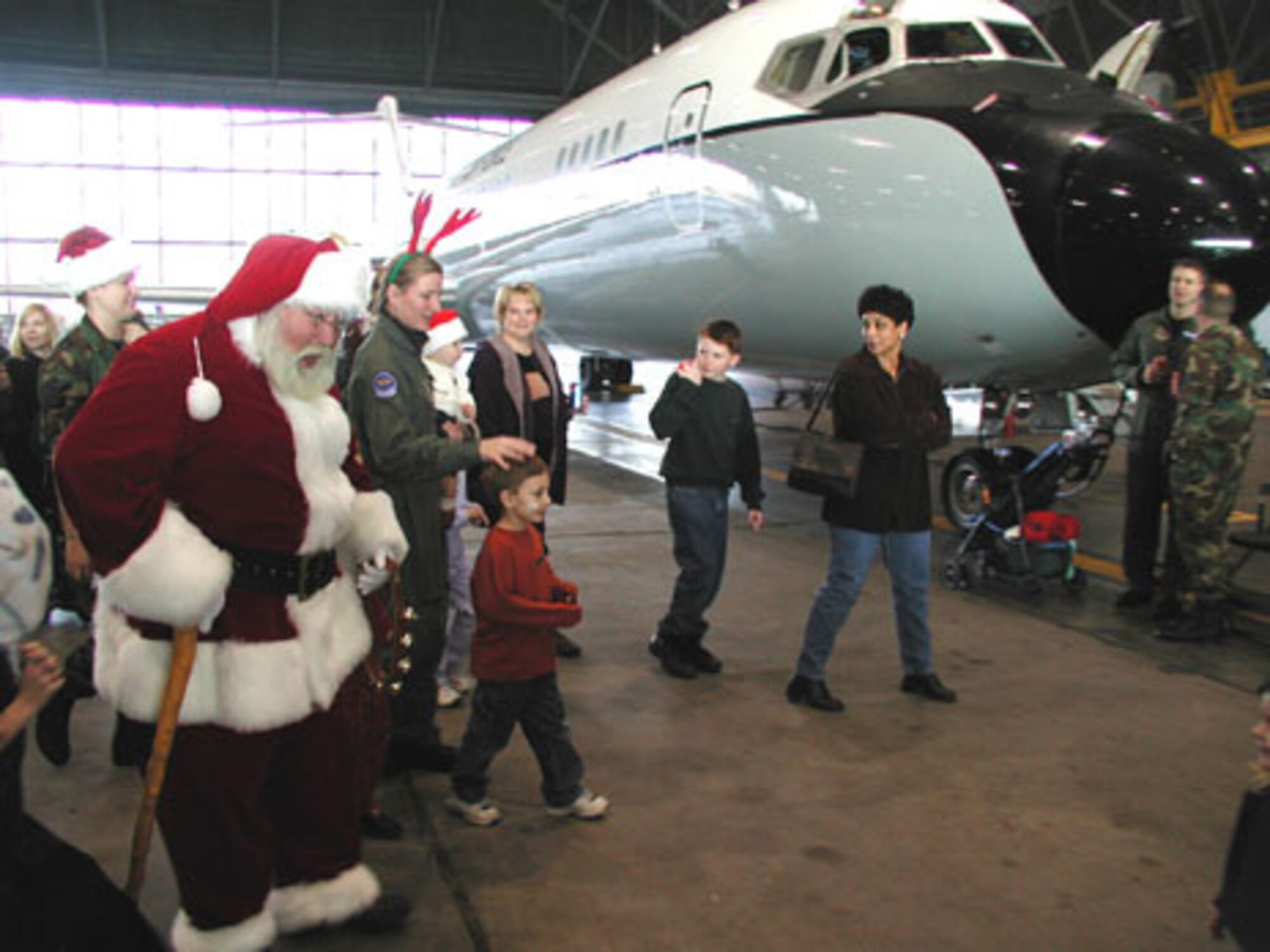 Santa came to visit the 932nd Airlift Wing and cheer the military unit a while back.  He has a return date set to visit with children aboard the newer C-9C aircraft this coming drill weekend.  Call the executive office at the wing for more information.