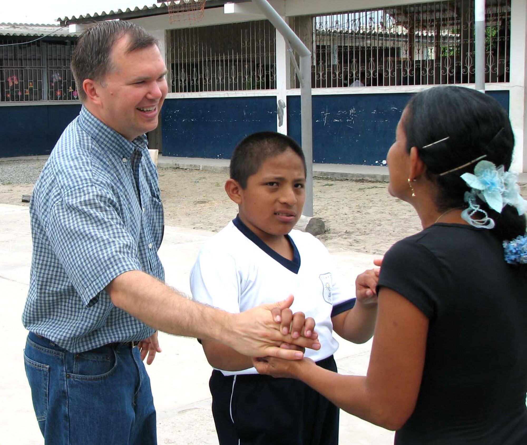 Chaplain (Capt.) Jeff Granger volunteers at the Angelica Flores School for the Handicapped in Manta, Ecuador. The chaplain, assigned to Manta Forward Operating Location, provides community relations in Manta and surrounding areas as part of his duties. (Courtesy photo)