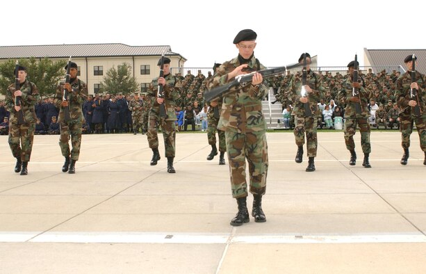 Airman 1st Class Jason Moree leads his 336th Training Squadron teammates through their freestyle routine at the final drill down of the 2006 season Oct. 20. The 336th TRS Red Wolves accumulated 44 points for the top spot of the season, which ended Oct. 20. The score combined bi-monthly drill competition results in open ranks inspection, regulation drill and freestyle drill. Rounding off the top three in the tight competition were the 335th TRS Bulls, 42 points, and 334th TRS Gators, 40 points.