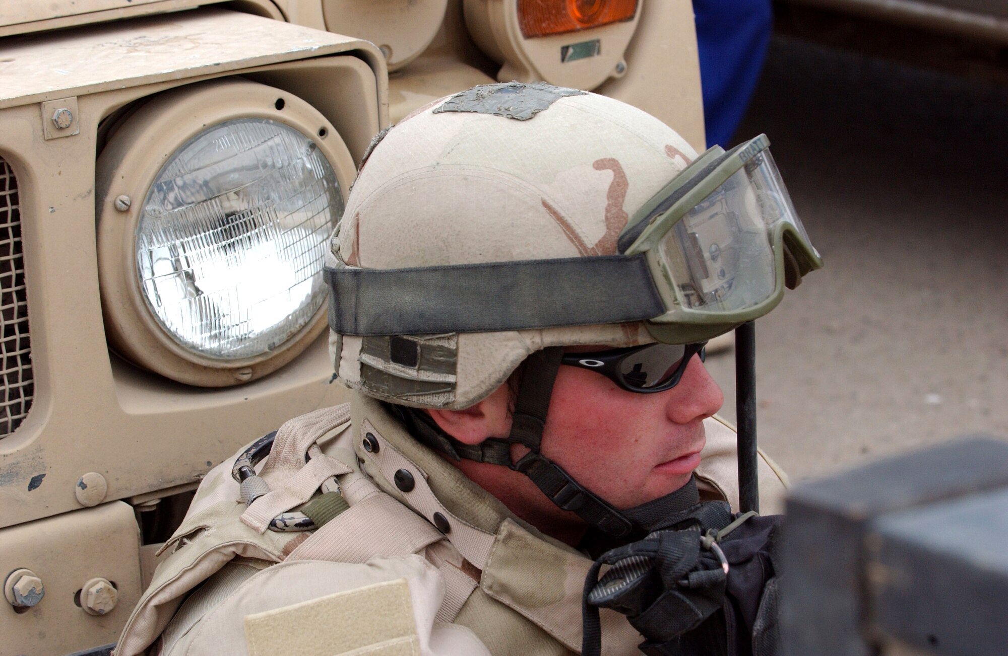 Senior Airman Michael Brait takes a break at the Hy Al-Amil district police precint Nov. 23 in Baghdad, Iraq. Airmen from Detachment 7, 732nd Expeditionary Security Forces Squadron deploy into the city streets of Baghdad assisting Iraqi police in achieving self-sufficiency. (U.S. Air Force photo/Master Sgt. Steve Cline) 
