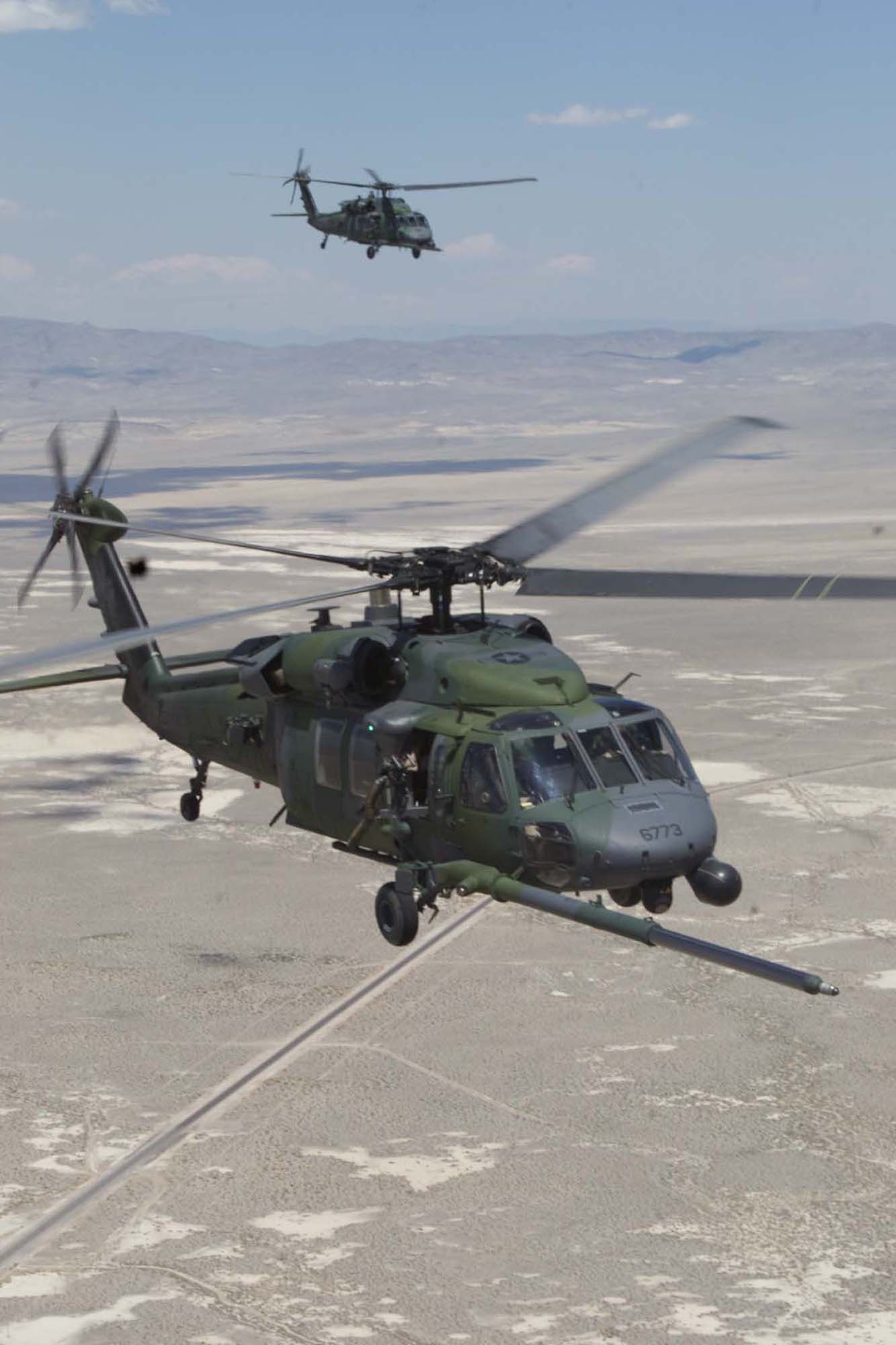 Aircrews from the 23rd Wing at Moody Air Force Base, Ga., perform a combat search and rescue mission in support of the Global War on Terrorism recently. These missions earned the 347th Rescue Wing the Air Force Outstanding Unit Award. The 820th Security Forces Group also received the AFOUA recently due to their continued support of the deployed force protection mission. (Courtesy photo)