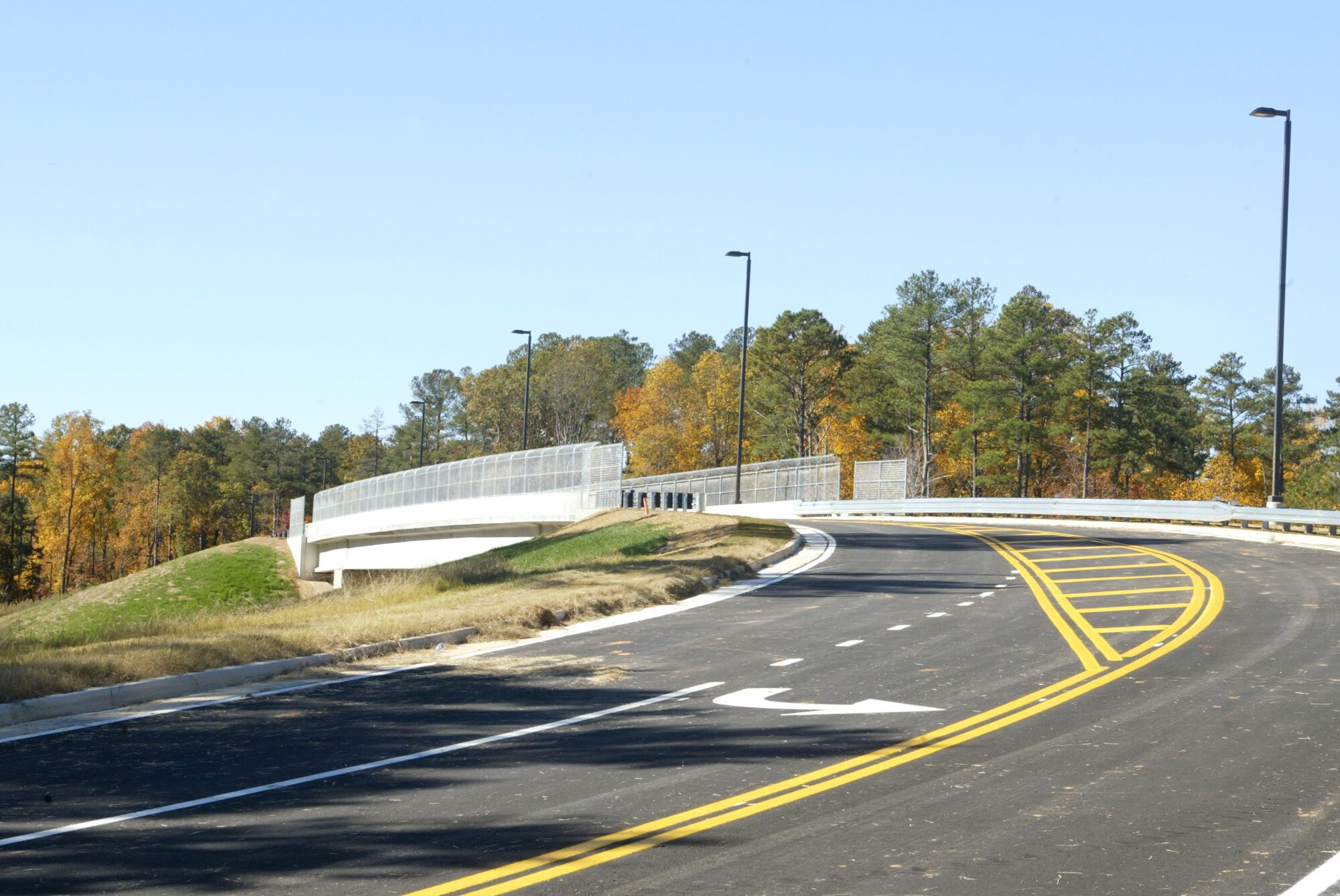 The planning and building of the 6,000 foot bridge took two years from start to finish. Construction started with a simple clearing of the land to its completed stage of 4,860 feet of sidewalk and its 220 feet long 40 feet wide massive overpass at completion. The bridge which crosses over South Cobb Drive will cut down on some of the traffic problems at the main gate of Dobbins ARB.