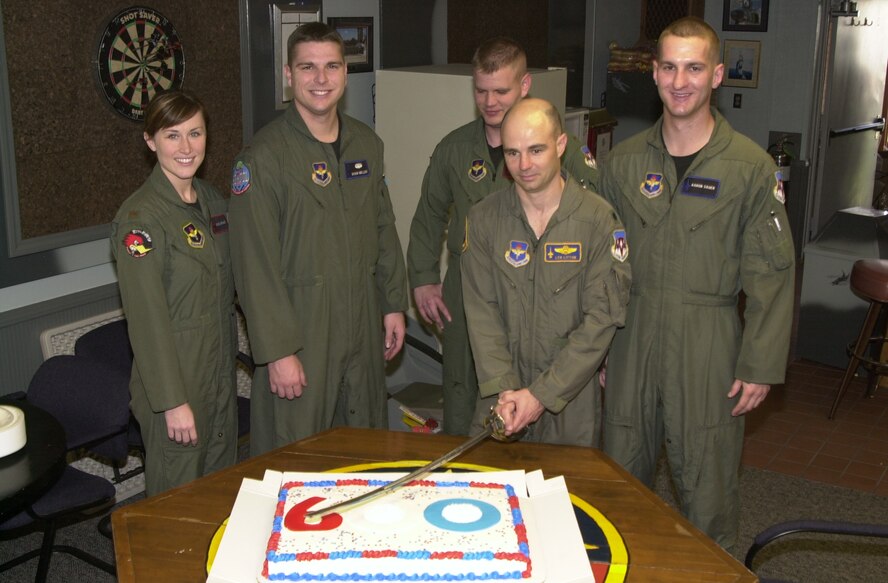 (Photo by 1st Lt. Lori Wise) Lt. Col. Leonard Litton (front), 25th Flying Training Squadron commander, and students from Class 05-07 and 05-09 celebrated 600 days with no driving under the influence incident March 24.