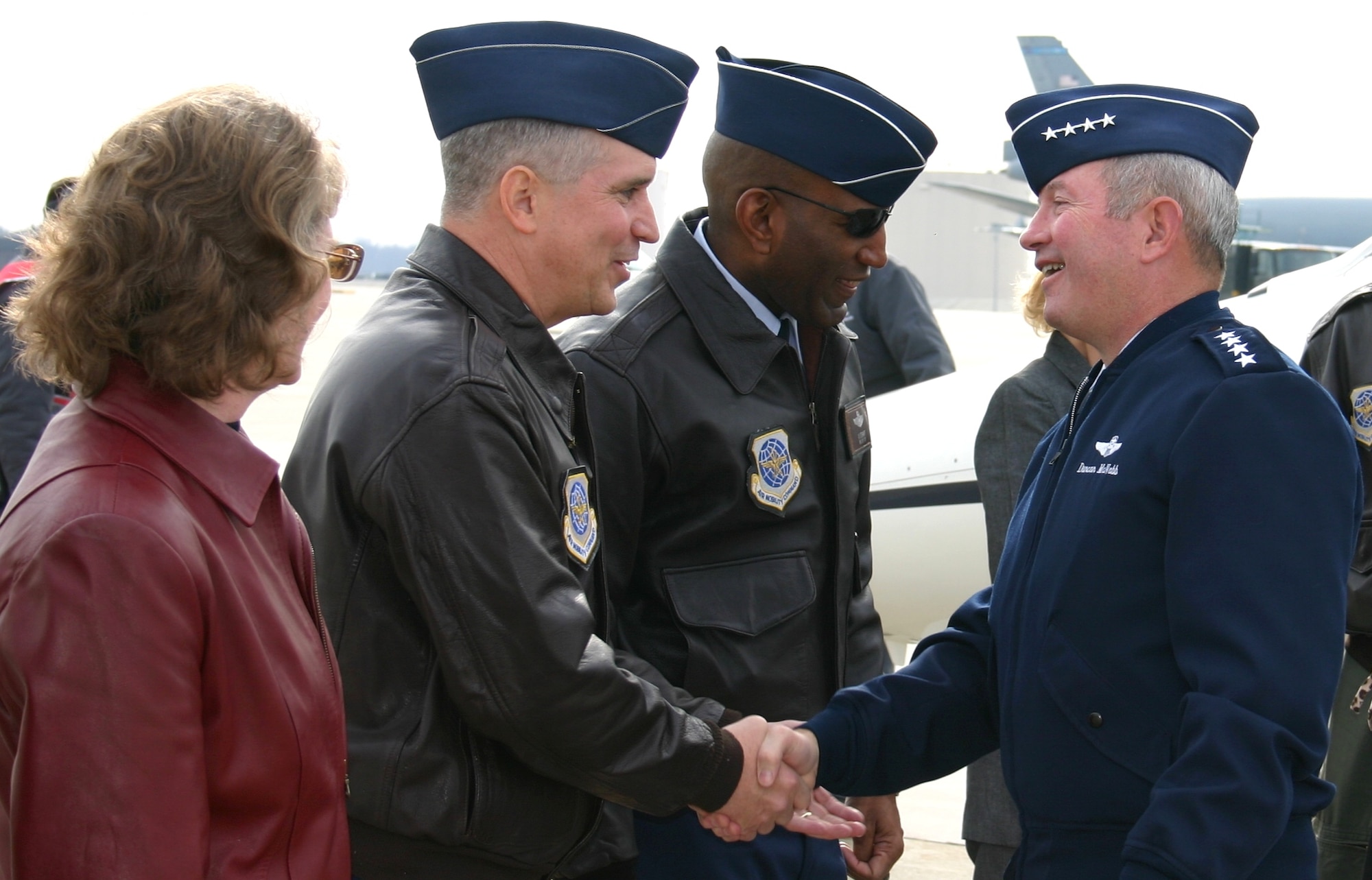 MCGUIRE AIR FORCE BASE, N.J. -- Gen. Duncan McNabb, right, commander Air Mobility Command, greets Col. Rick Martin, 305th Air Mobility Wing commander, on the McGuire Air Force Base, N.J., flight line during his arrival Monday. General McNabb was here visiting the 21st Expeditionary Mobility Task Force and Air Mobility Warfare Center. 