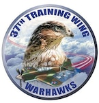 The 37th Training Wing Warhawk Logo includes a file photo of a Cooper's hawk. Chris Young/The State Journal-Register.