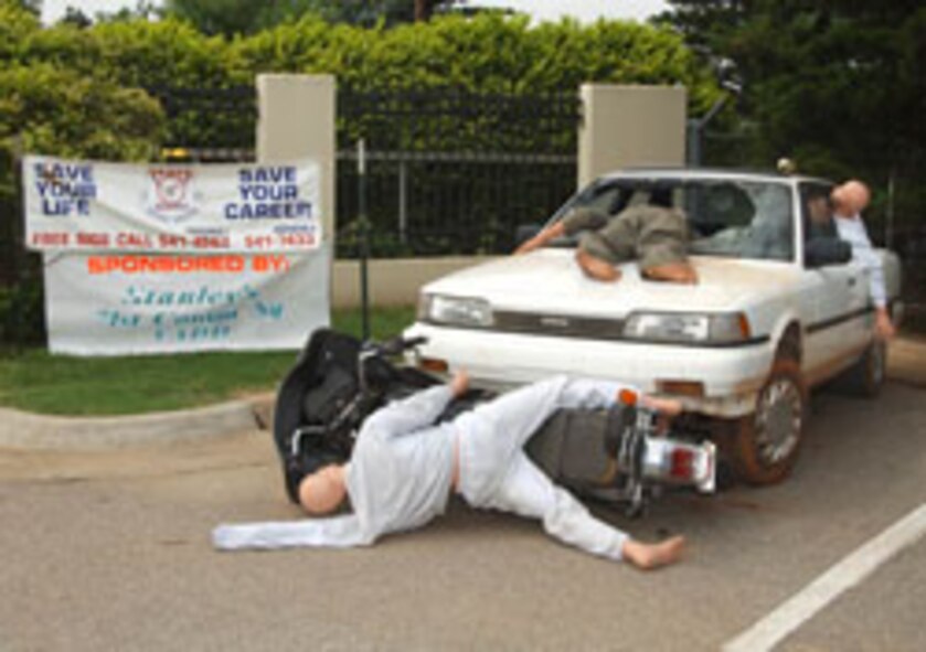 (Photo by Terry Wasson) Scenes like the one in this safety day display at the main gate have become all too familiar lately, but Team Vance survived the Memorial Day weekend without a fatality.