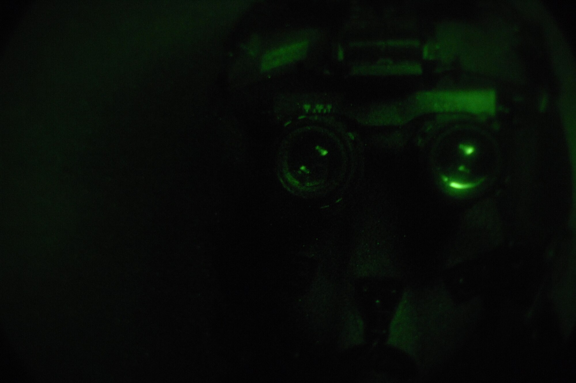 EIELSON AIR FORCE BASE, Alaska -- Staff Sgt Timothy Huffman checks for lens defects on a pair of AN/AVS-9 Night Vision Goggles (NVG's) in the Life Support Section of the 355th Fighter Squadron here on 29 Nov. During the winter months pilots of Eielson Air Force Base, Alaska are given a greater opportunity to train with NVG's more than their counterparts in the lower 48 states due to the decrease length of sunlight.
(U.S. Air Force Photo by Staff Sgt Joshua Strang)