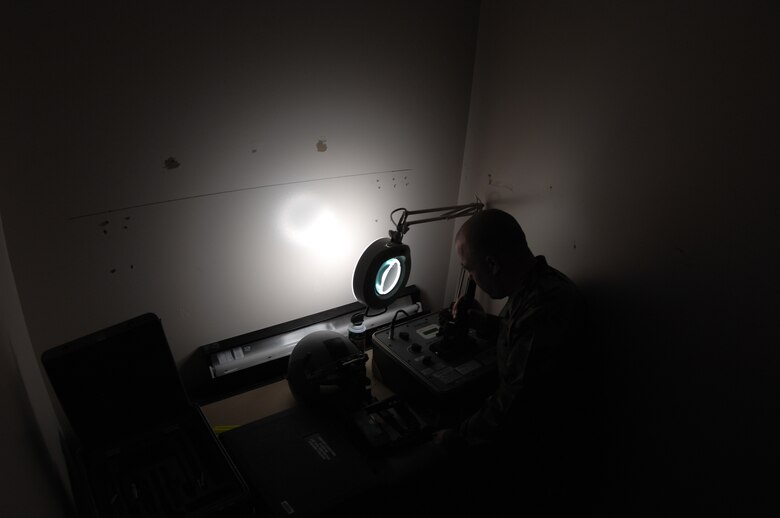 EIELSON AIR FORCE BASE, Alaska -- Staff Sgt Timothy Huffman checks for lens defects on a pair of AN/AVS-9 Night Vision Goggles (NVG's) in the Life Support Section of the 355th Fighter Squadron here on 29 Nov. During the winter months pilots of Eielson Air Force Base, Alaska are given a greater opportunity to train with NVG's more than their counterparts in the lower 48 states due to the decrease length of sunlight.
(U.S. Air Force Photo by Staff Sgt Joshua Strang)