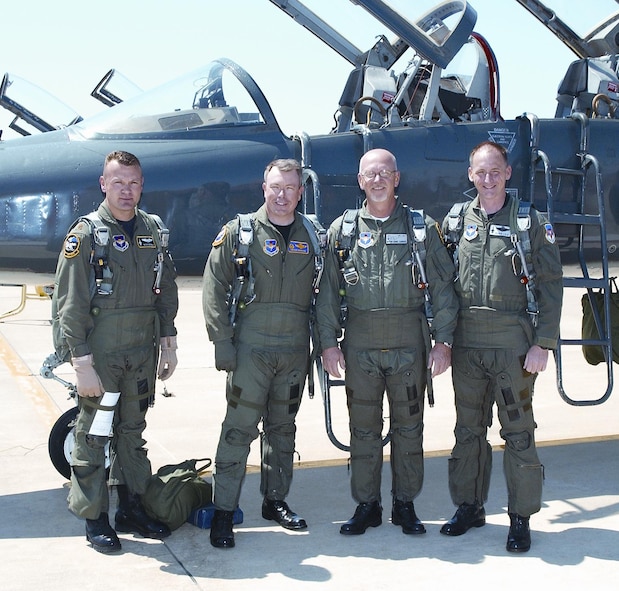 (Photo by Terry Wasson) Maj. Richard Benda, 71st Operations Support Squadron; Col. Bryan Benson, 71st Flying Training Wing commander; Enid Mayor Ernie Currier; and Lt. Col. Edward Lyle, 71st FTW plans chief, flew in a two-ship formation during a demonstration flight for Mayor Currier Wednesday. Colonel Lyle piloted a T-38C with the mayor, and Major Benda piloted a T-38C with Colonel Benson.