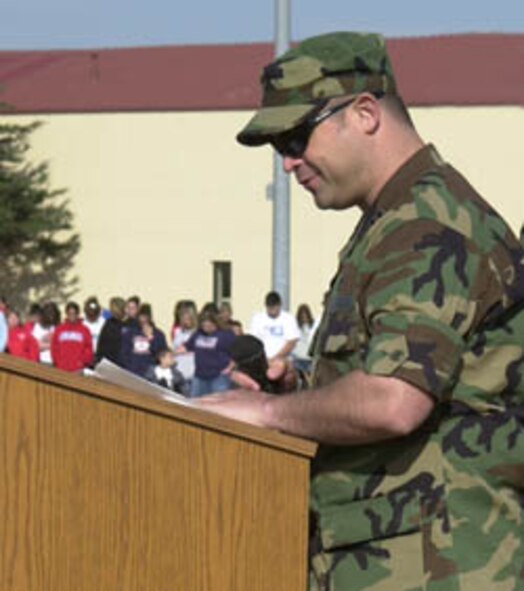 (Photo by Frank McIntyre) Chaplain (Capt.) Sam Bridges gives the invocation during the opening ceremony of the Special Olympics.