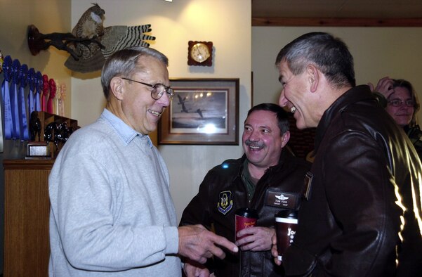 From left, Mr. Burdette Stief, Jordan Minn. landowner, talks with Chief Master Sgt. Tom Foss, 934th Operations Group, and Brig. Gen. Richard Severson, AFRC assistant vice commander, at his ranch after signing a 5 year lease allowing the 934th to continue to use his land for practicing air drop operations. (US Air Force Photo/Tech. Sgt. Jeffrey Williams)