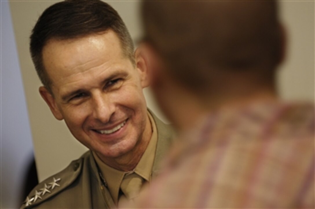 Chairman of the Joint Chiefs of Staff Gen. Peter Pace, U.S. Marine Corps, shakes hands with a student at the Wharton School of the University of Pennsylvania in Philadelphia, Pa., on Nov. 28, 2006.  Pace spoke to students at the business school and took questions.  